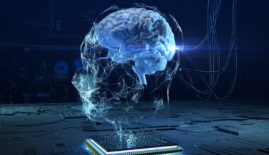 A digital image of a brain hovers above a computer chip.