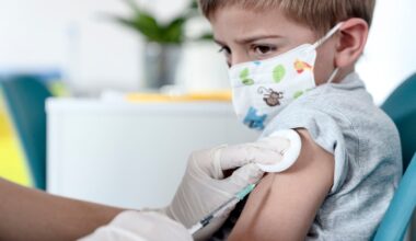 A young child receiving a shot.