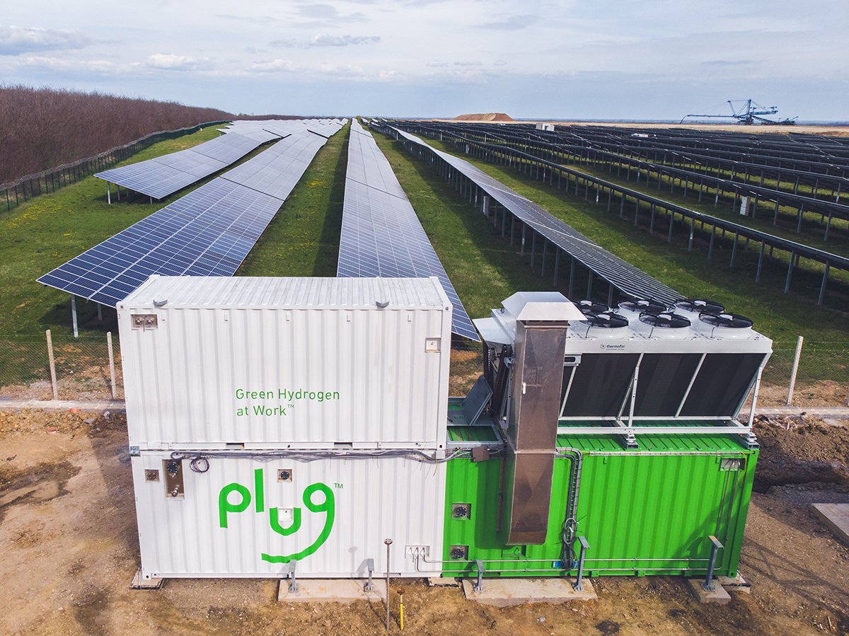 Plug Power's electrolyzer system outside of a solar farm.