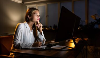 A person is taking notes for an online learning program.