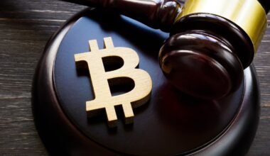 The Bitcoin symbol with a gavel next to it.