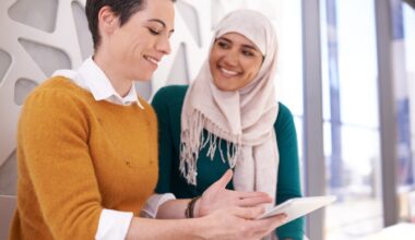 Person talks to other person on tablet.