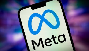 Meta name and logo on smartphone screen.