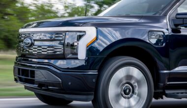 Ford's F-150 Lightning EV on a road.
