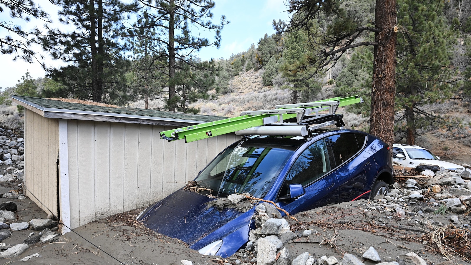 Rain-soaked California still at risk of floods and high surf