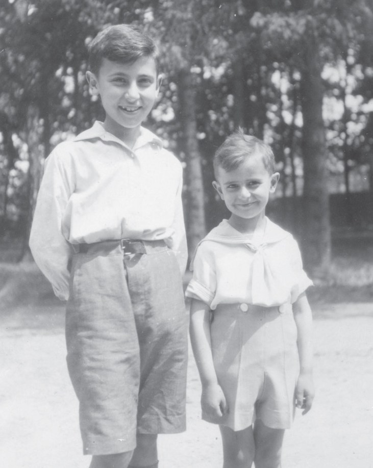 Ted Meron, aged five, with his older brother.