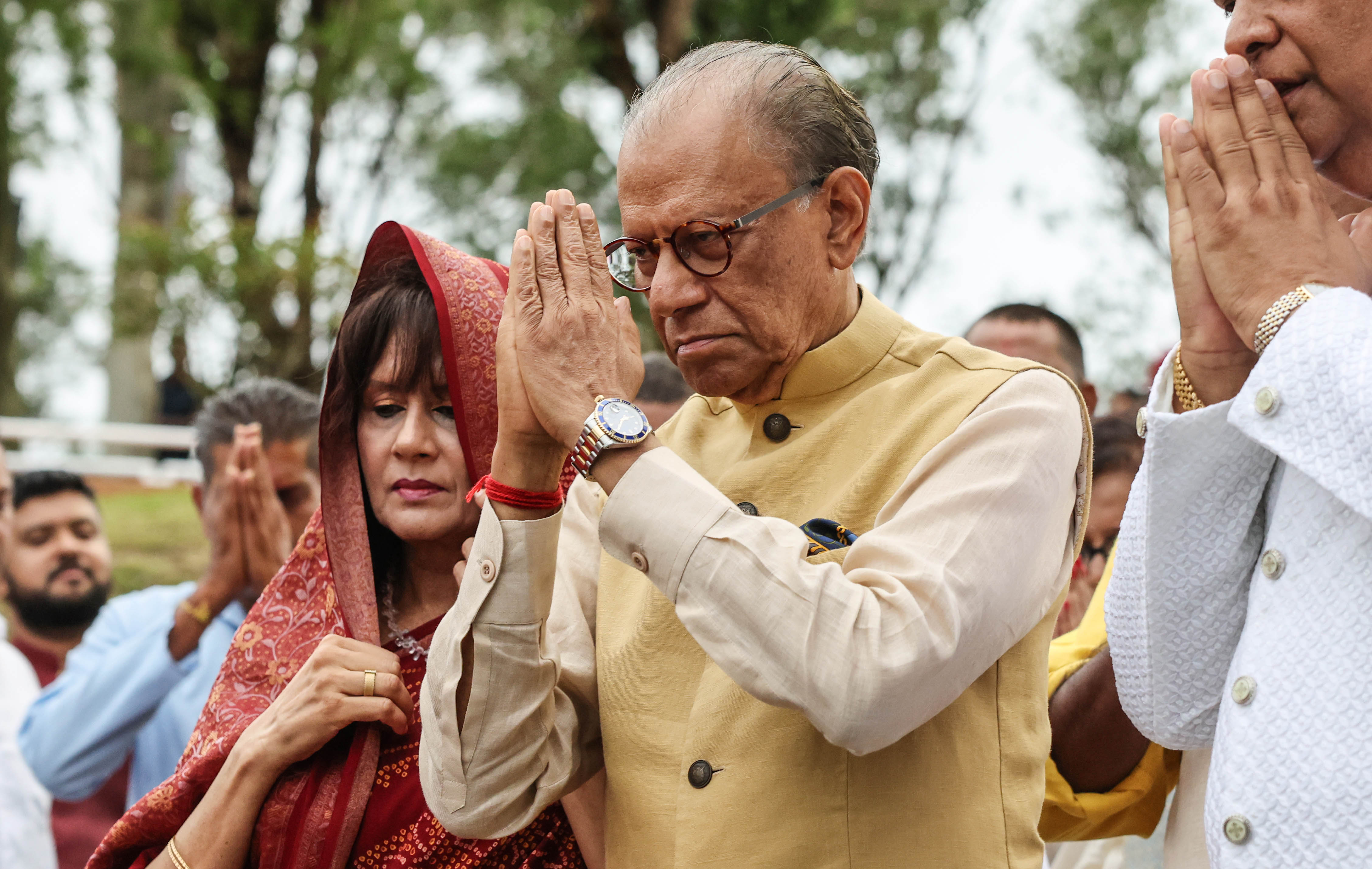 Prime Minister Navin Ramgoolam and his wife Veena Ramgoolam pray at Grand Bassin during the Maha Shivratree Hindu festival.