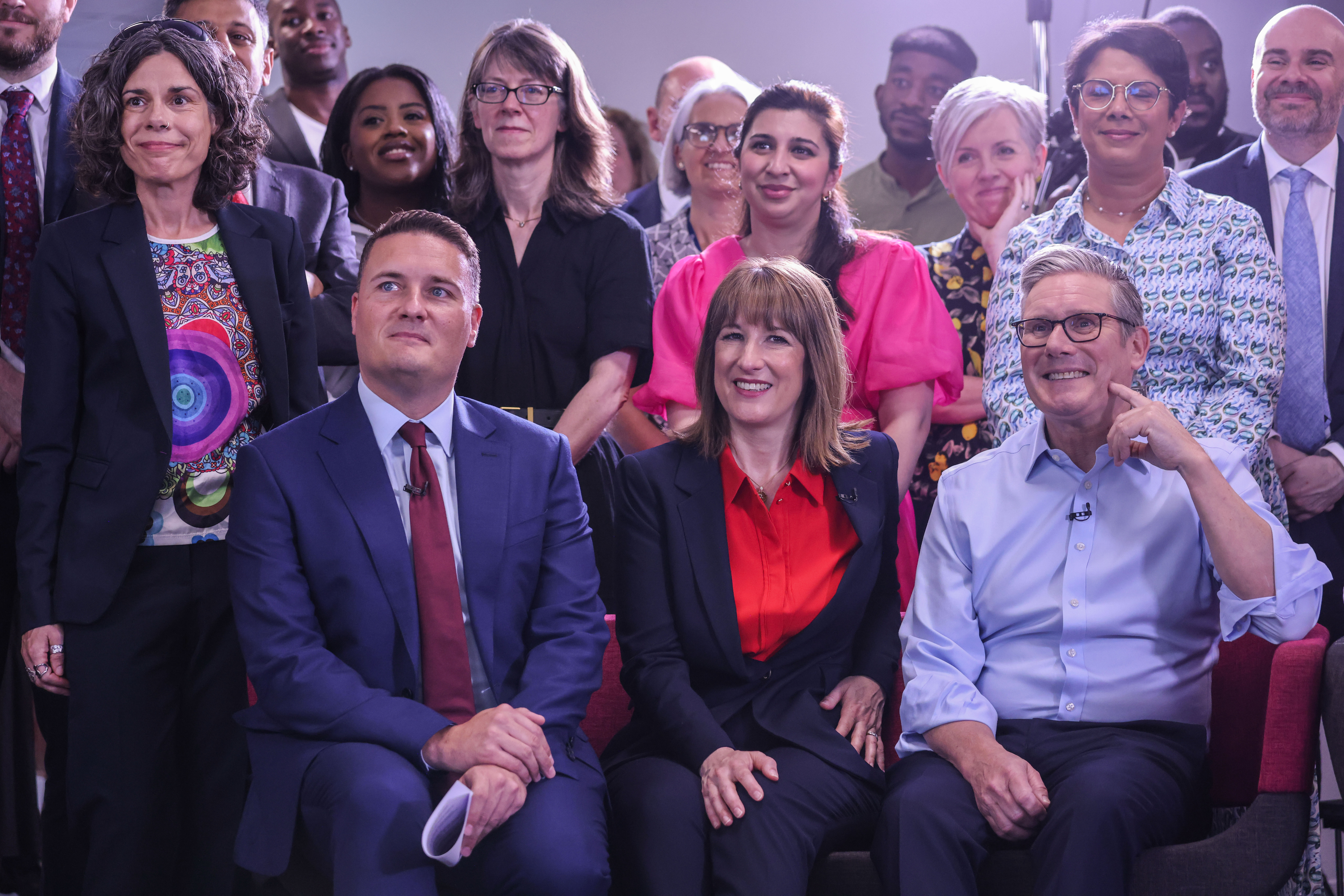 Prime Minister Keir Starmer, Chancellor Rachel Reeves, and Health Secretary Wes Streeting seated with other officials.