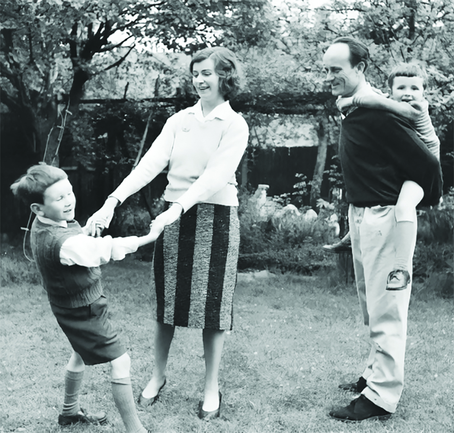 Publicity photograph of the family, with Edna O’Brien and her son Carlo holding hands, and Ernest Gébler carrying Sasha on his back.