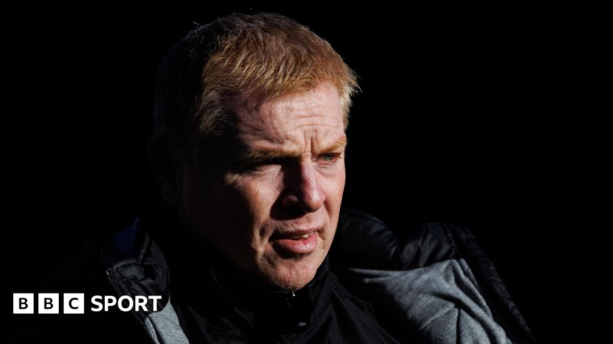 Dunfermline Athletic manager Neil Lennon is pictured in shadow against a black background