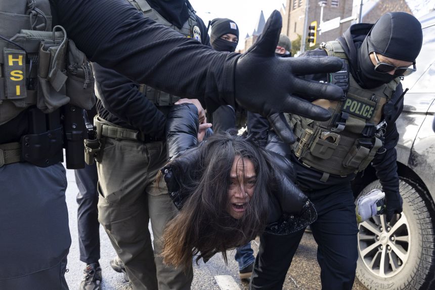 Aliya Rahman, a US citizen, is dragged from her car by federal agents after she was driving through a protest in Minneapolis on January 13. The Department of Homeland Security tweeted that she was arrested for obstruction after ignoring multiple commands to move her vehicle. Rahman <a href=