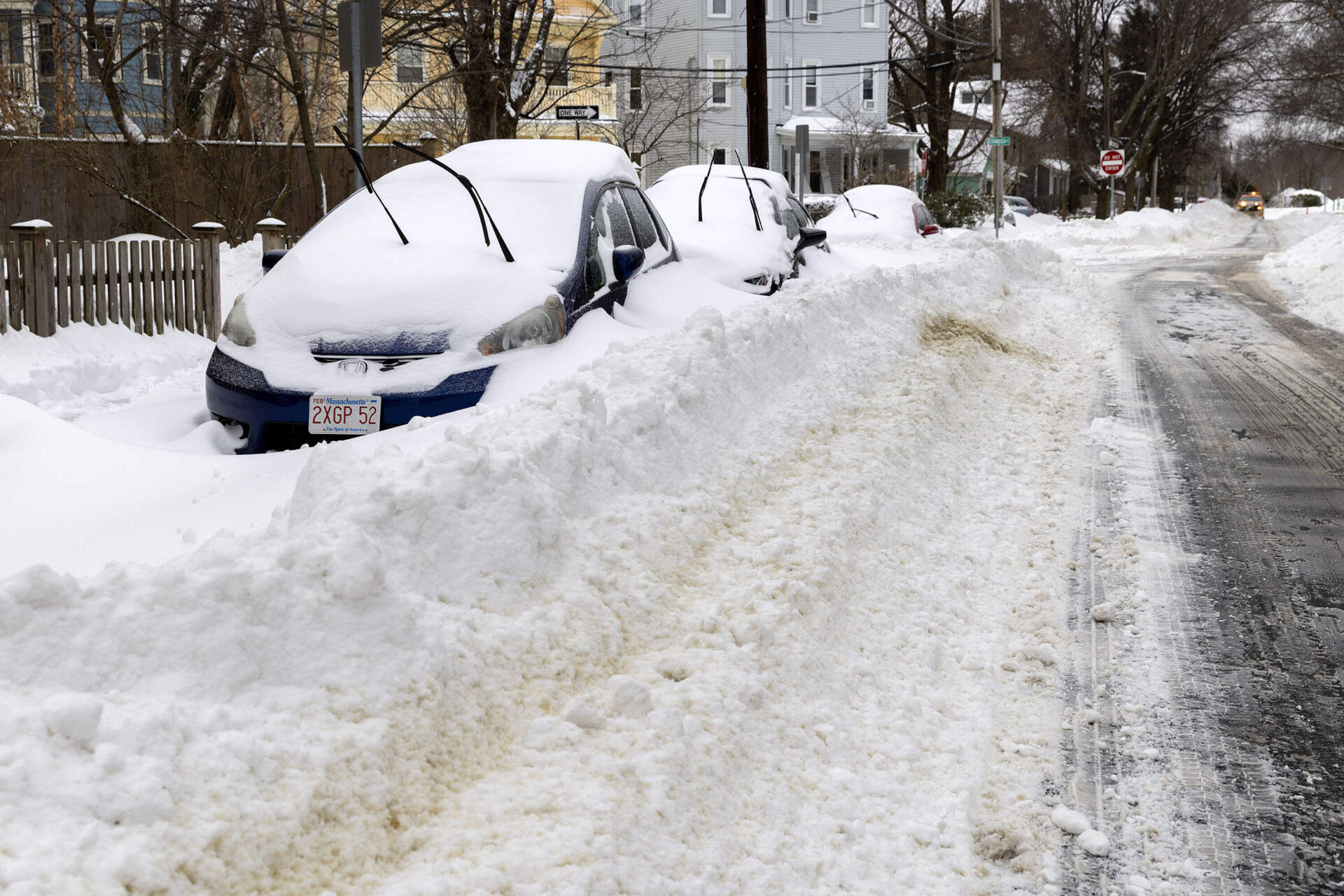 Vehicles plowed in overnight, as Cambridge emerges from its first major snowstorm of 2026. (Robin Lubbock/WBUR)