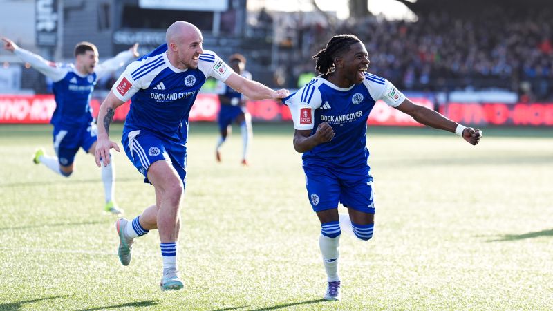 Soccer-FA Cup holders Palace knocked out by non-league Macclesfield