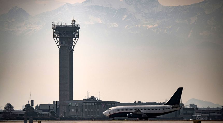 Santiago Arturo Merino Benitez International was the large airport with the best on-time performance record in 2025.
