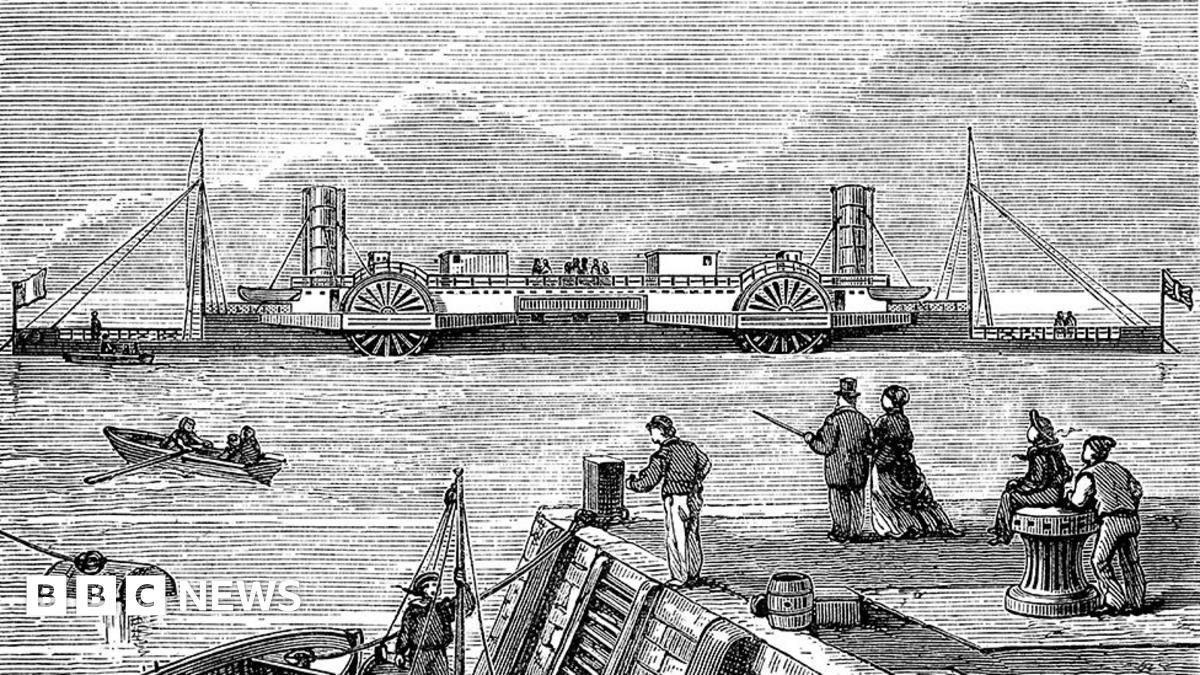 Vintage black and white newspaper engraving of the SS Bessemer. It has four paddle wheels front and back and two funnels. It flies the French and British flags. A number of people stand on a quayside in the foreground watching it sail past.