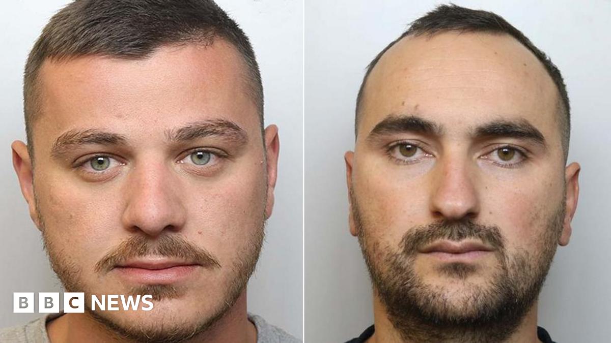 Police custody images of Endrit Nikolli (left) with brown hair wearing a grey t-shirt and beard and Sidorjan Lleshi with dark brown hair and beard and wearing a black t-shirt.