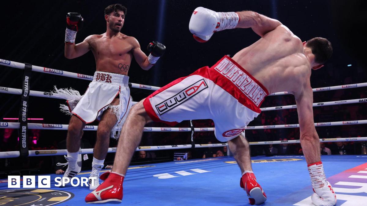 Josh Kelly looks on as Bakhram Murtazaliev falls