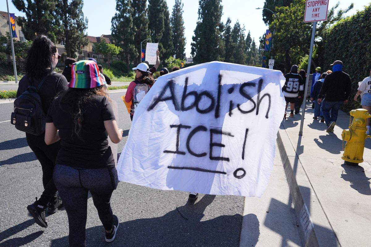 People march along a street during a protest on Wednesday, June 11, 2025, in Paramount, Calif. (AP Photo/Jae C. Hong, File)