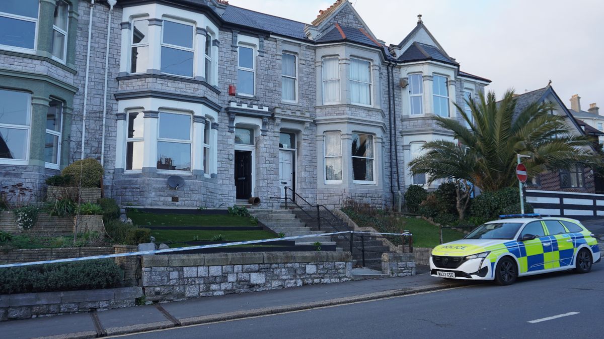 Police on scene guard following acid attack incident in Lipson Road, Plymouth