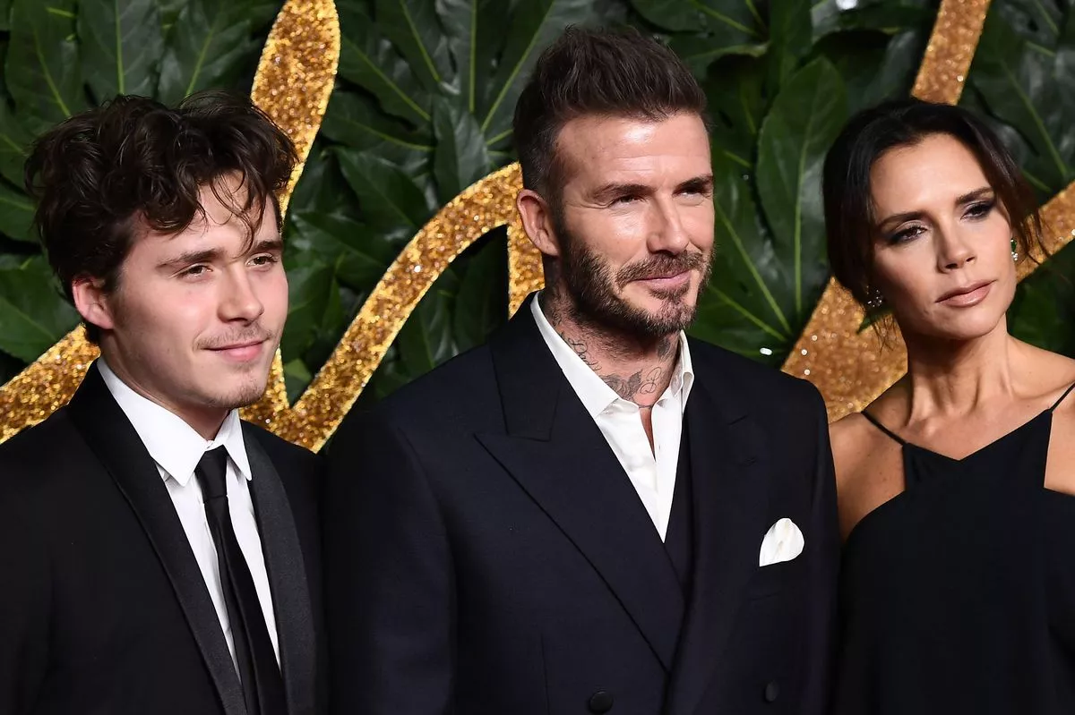 Brooklyn Beckham, David Beckham and Victoria Beckham
