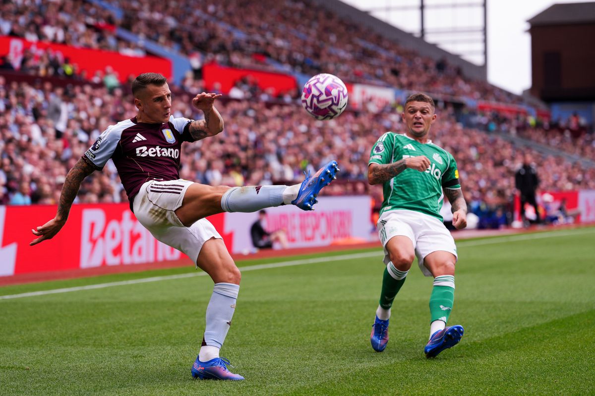 Aston Villa's Lucas Digne clears from Newcastle United's Kieran Trippier