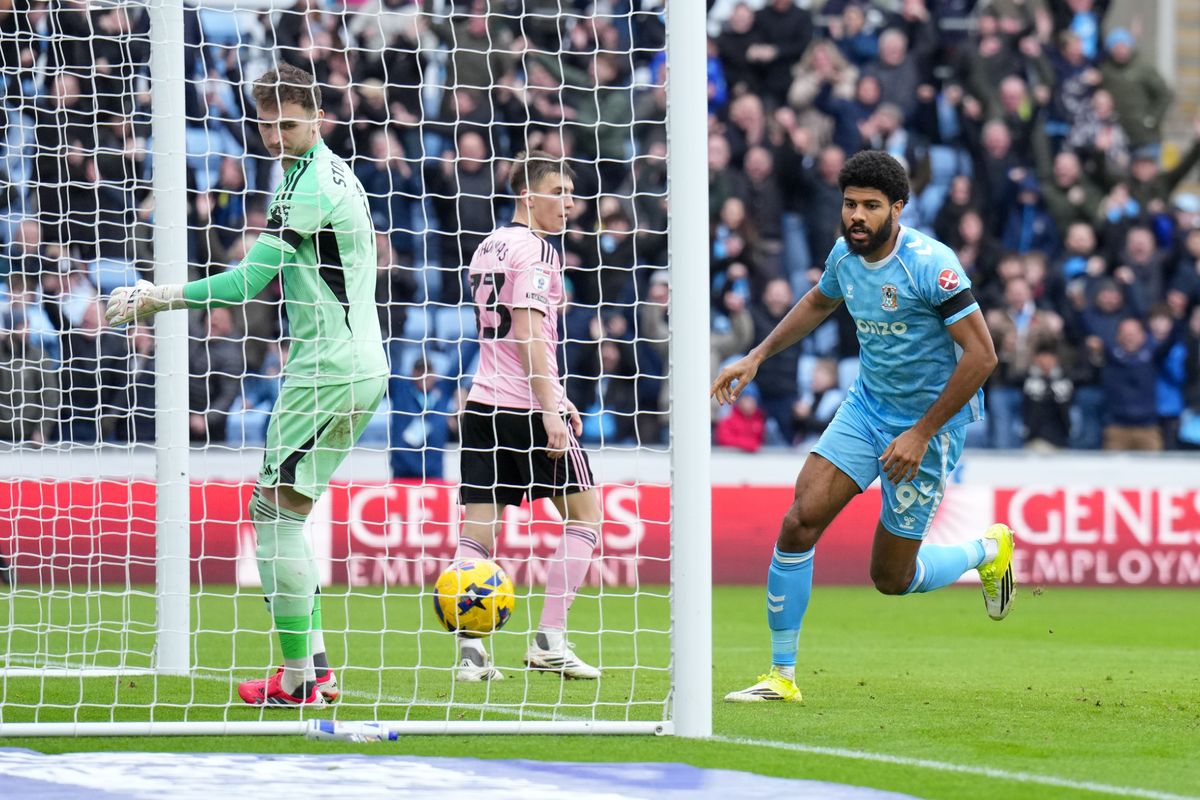 Ellis Simms of Coventry City celebrates his goal against Leicester City