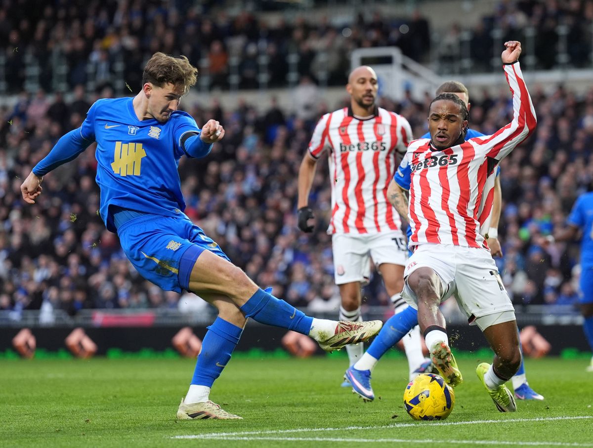 Birmingham City's Phil Neumann takes a shot blocked by Stoke City's Eric Junior Bocat