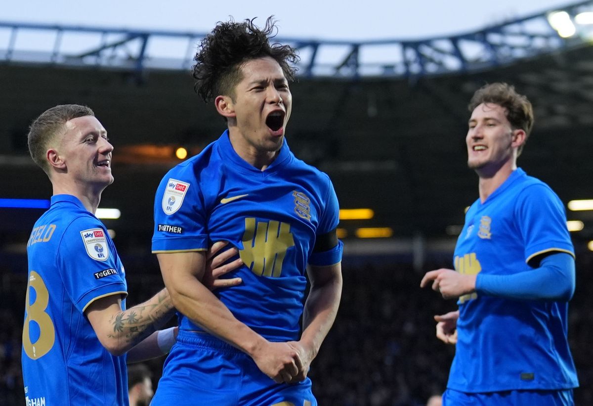 Birmingham City's Tomoki Iwata (centre) celebrates scoring