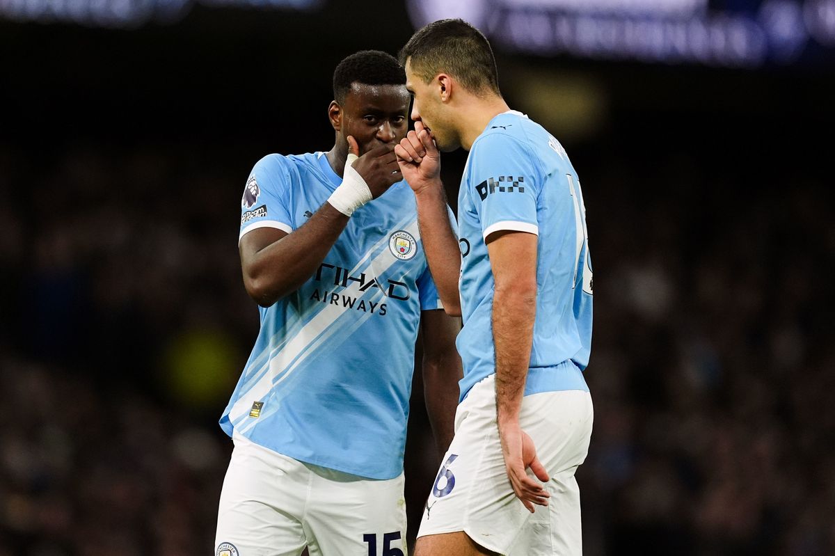 Marc Guehi and Rodri of Manchester City