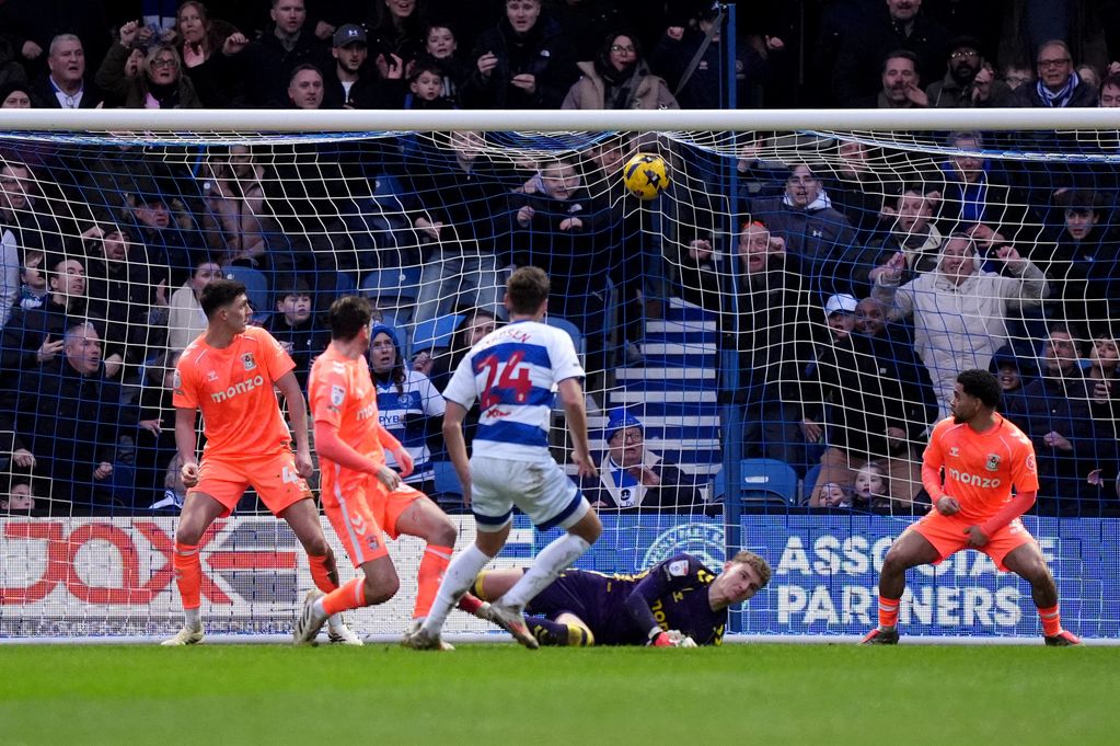 Queens Park Rangers' Nicolas Madsen (centre) scores his sides second goal against Coventry City