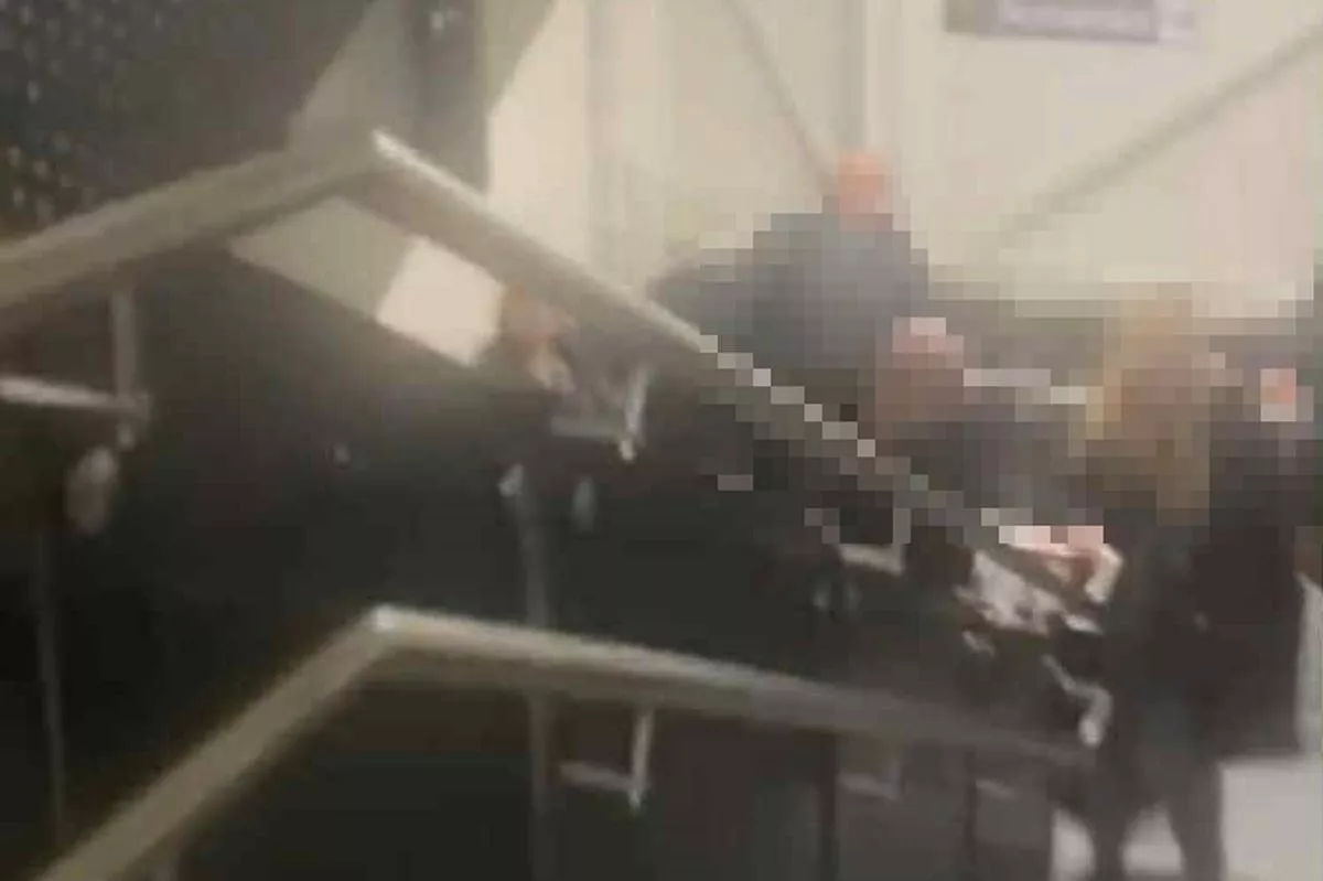 Passengers for the Jet2 plane waiting in the stairwell where they were 'left behind'