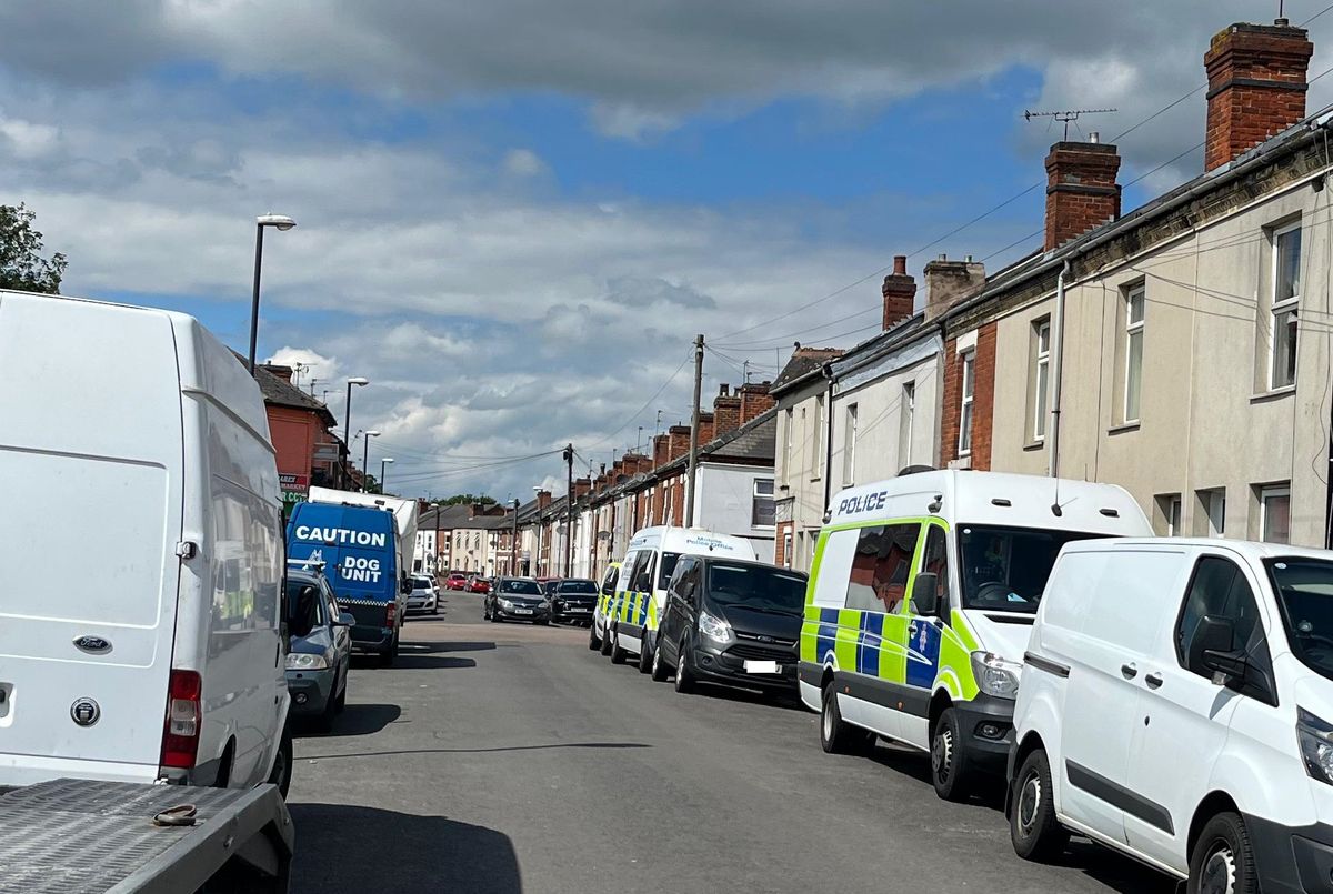 Police in Princes Street, in Normanton, Derby.