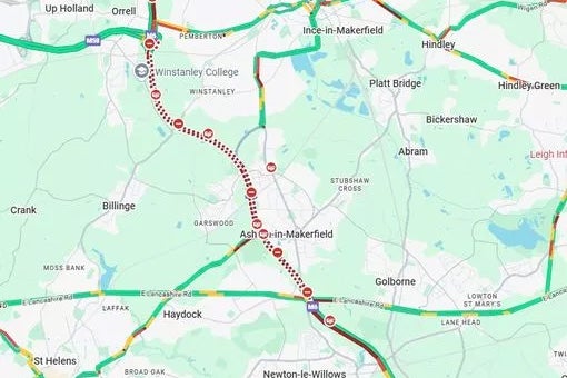 A woman has died following an incident on the M6 near Haydock this morning