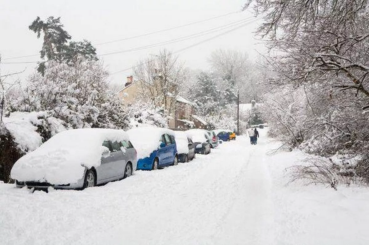 Snow covered residential street in Godalming, Surrey, England, UK