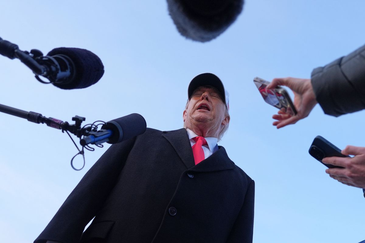 President Donald Trump speaks with reporters at Joint Base Andrews, Tuesday, Jan. 13, 2026, in Joint Base Andrews, Md. (AP Photo/Evan Vucci)