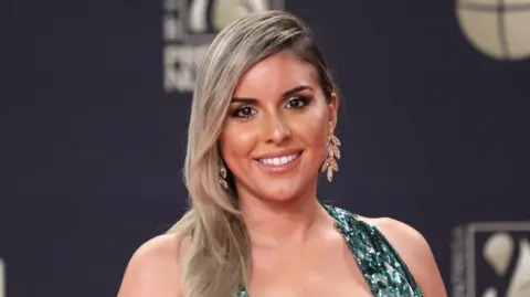 Getty Images Vianca Rodriguez at an awards ceremony in Miami in 2023