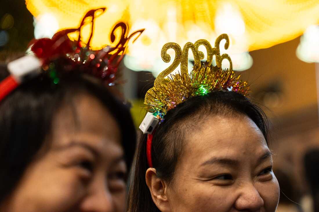 People attend the New Year countdown event to celebrate the start of 2026 in the Central district of Hong Kong