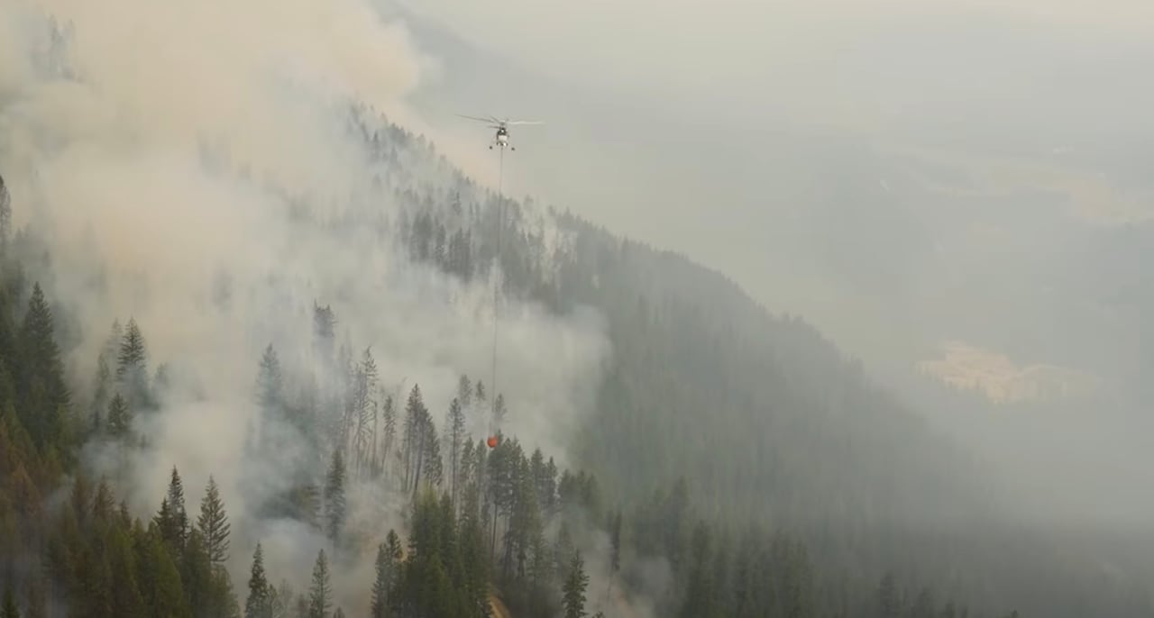 wildfire being actioned by a helicopter