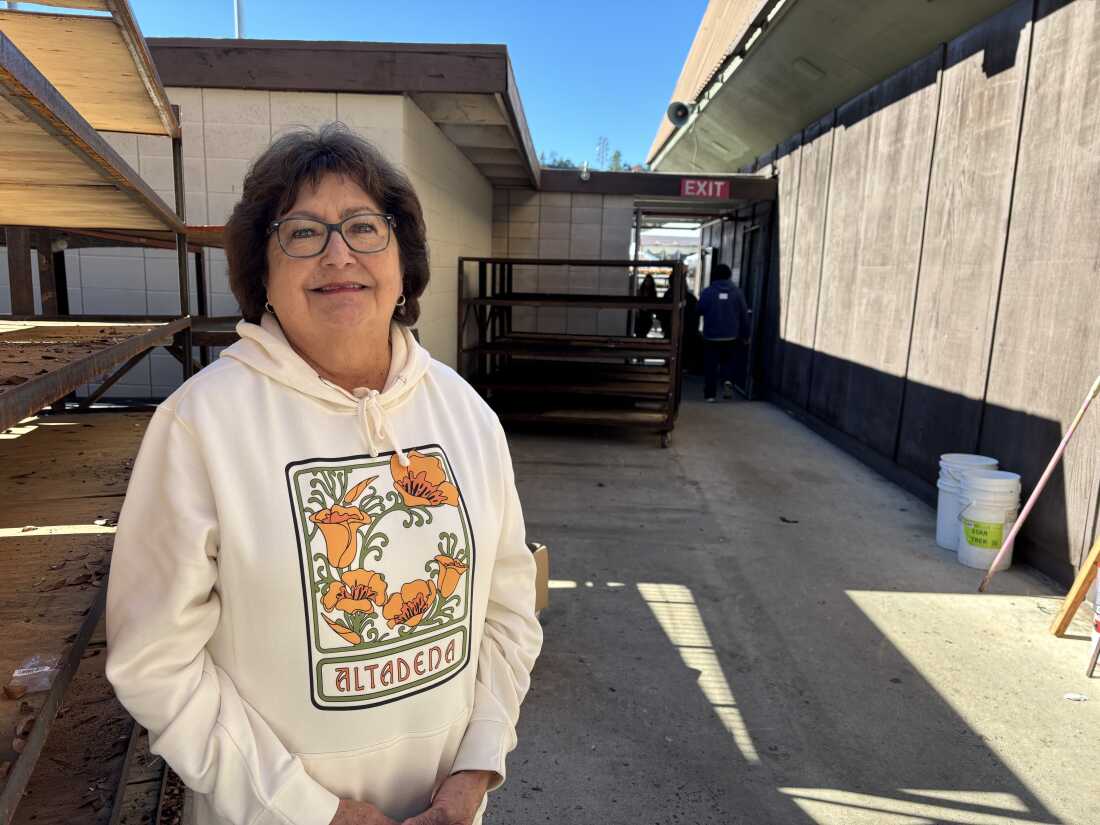 Darlene Leyba plans to rebuild her home, which burned in the Eaton Fire. "Altadena's home," she says. "We want to be back." In the meantime, she is honored to represent her community by working on the float.