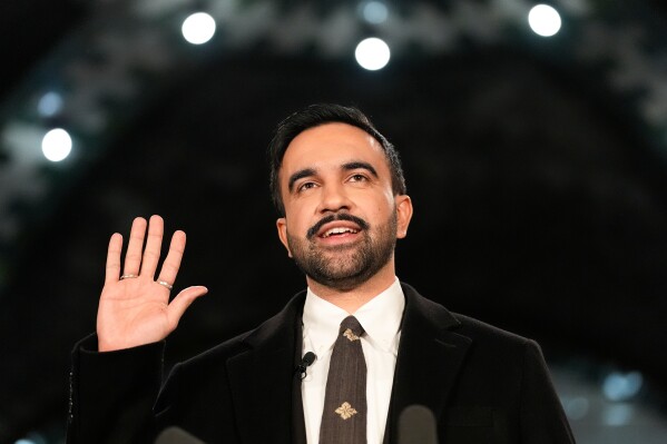 Mayor-elect Zohran Mamdani takes the oath of office during a swearing-in ceremony in the Old City Hall subway station, Thursday, Jan. 1, 2026, in New York. (AP Photo/Yuki Iwamura)