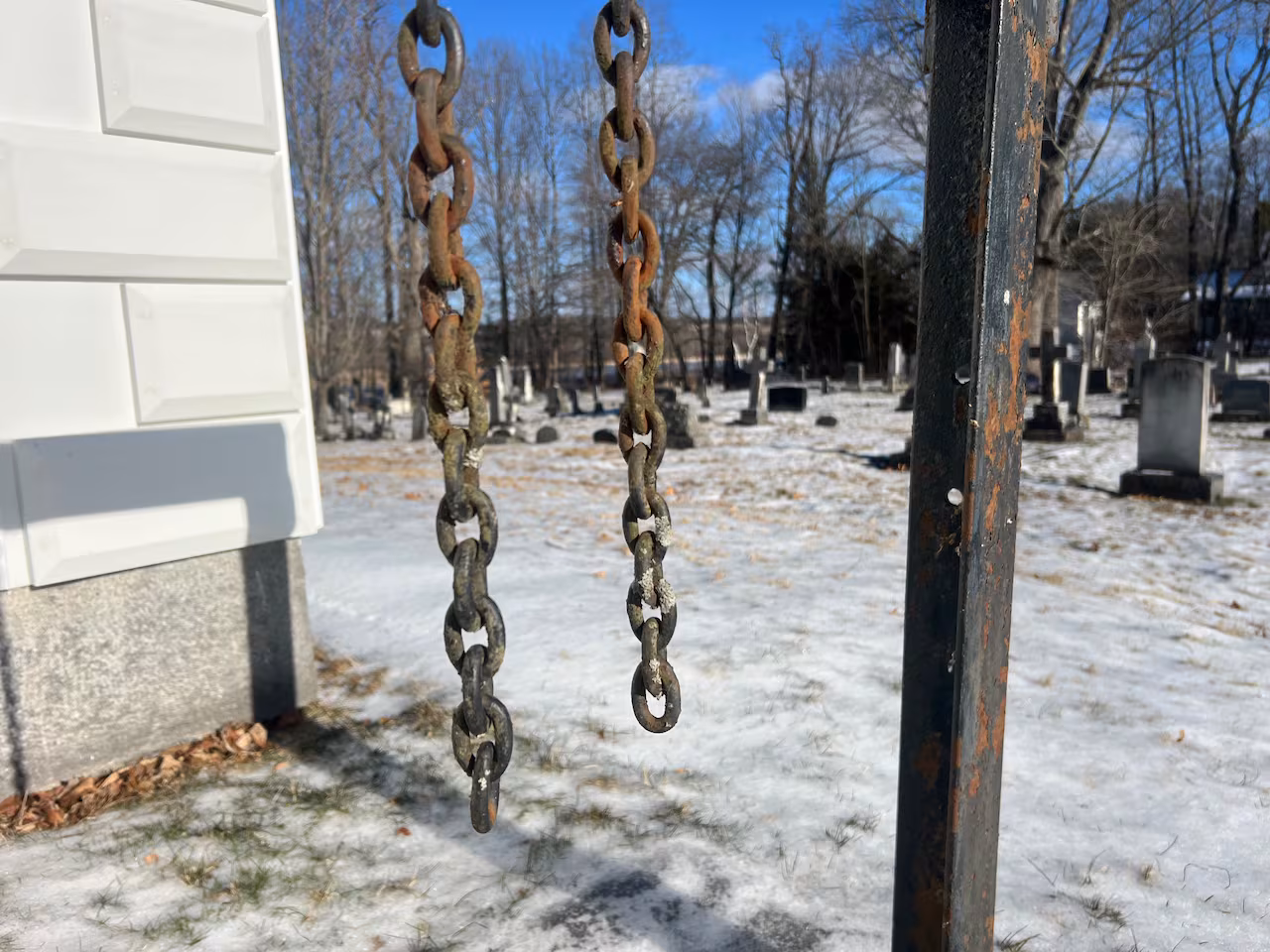 Chains hanging from a post