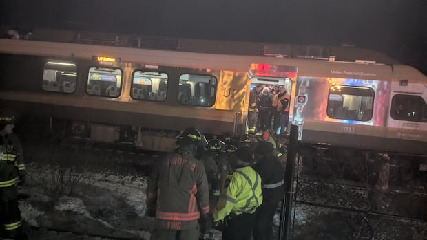 Woman charged with impaired driving after vehicle hit by train at Toronto GO station