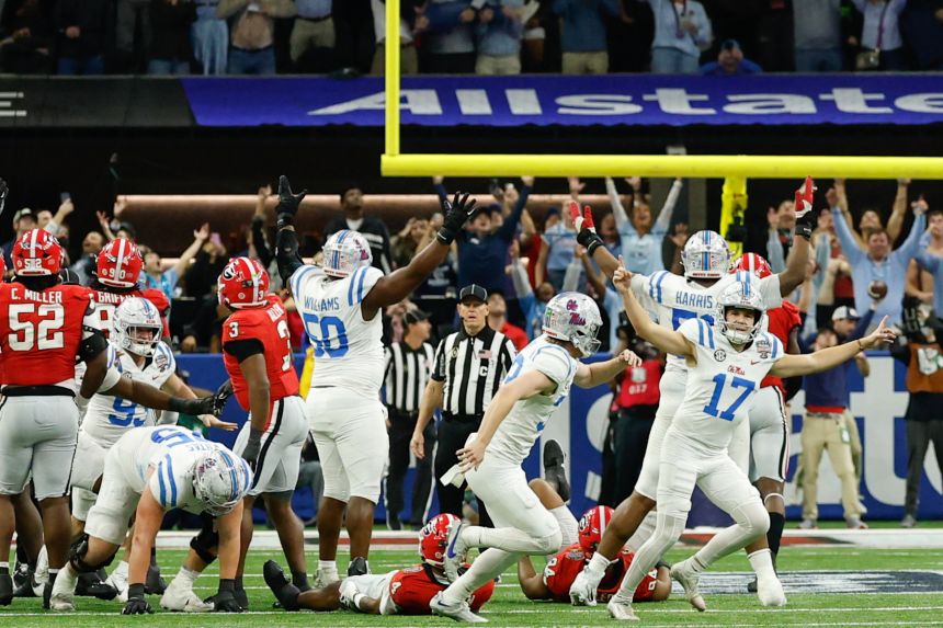 Kicker Lucas Carneiro celebrates after a field goal against the Georgia Bulldogs in the fourth quarter -- giving his team the lead with 6 seconds to go.