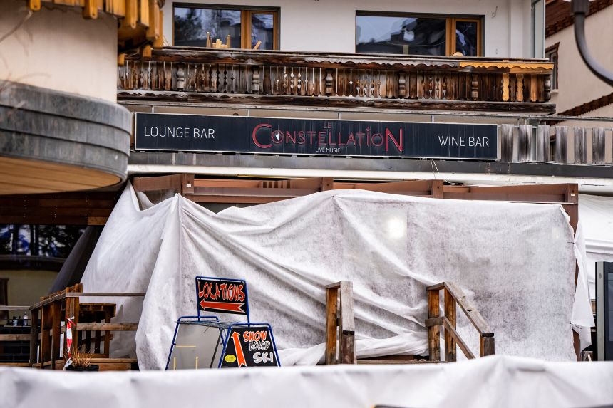 This photograph shows the entrance of the bar Le Constellation where a fire ripped through the venue during New Year's Eve celebrations in the Alpine ski resort town of Crans-Montana killing around 40 people and injuring more than 100 others, in Crans-Montana on January 2, 2026.