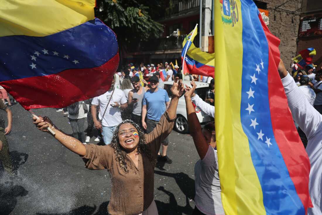 Venezuelans living in Chile celebrate in Santiago, after U.S. forces captured Venezuelan leader Nicolas Maduro after launching a "large scale strike" on Venezuela. The Trump administration said on December 3 that Venezuela's captured Maduro and his wife will face "the full wrath of American justice" under drug and terrorism charges.