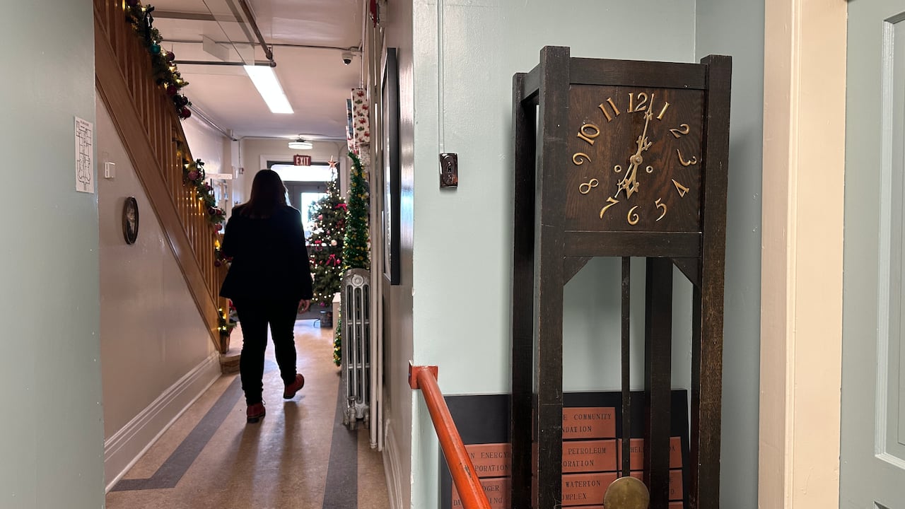 A hallway and old clock.