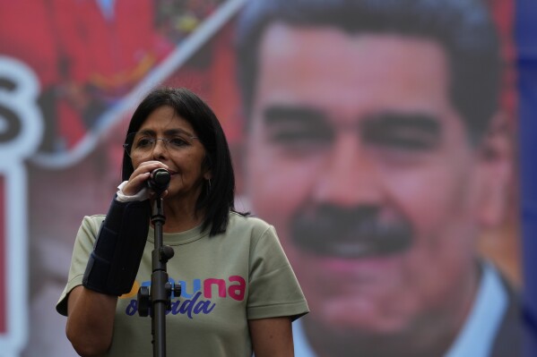 Vice President Delcy Rodriguez speaks to supporters during a rally in defense of a proposed bill titled, "Law against fascism, neofascism and similar expressions", in discussion by lawmakers, in Caracas, Venezuela, Aug. 23, 2024. (AP Photo/Ariana Cubillos, File)