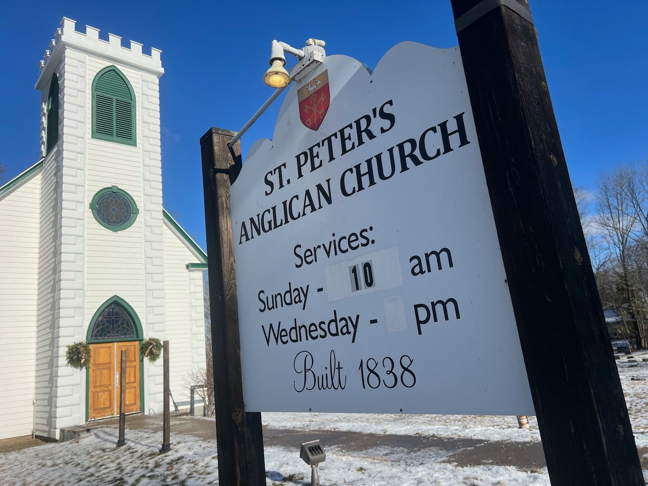 A church and a sign in front