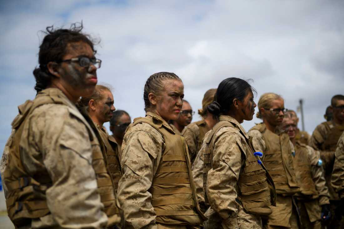 United States Marine Corps recruits from Lima Company, the first gender integrated training class in San Diego, receive a safety briefing on April 21, 2021 at Camp Pendleton in San Diego County, California.