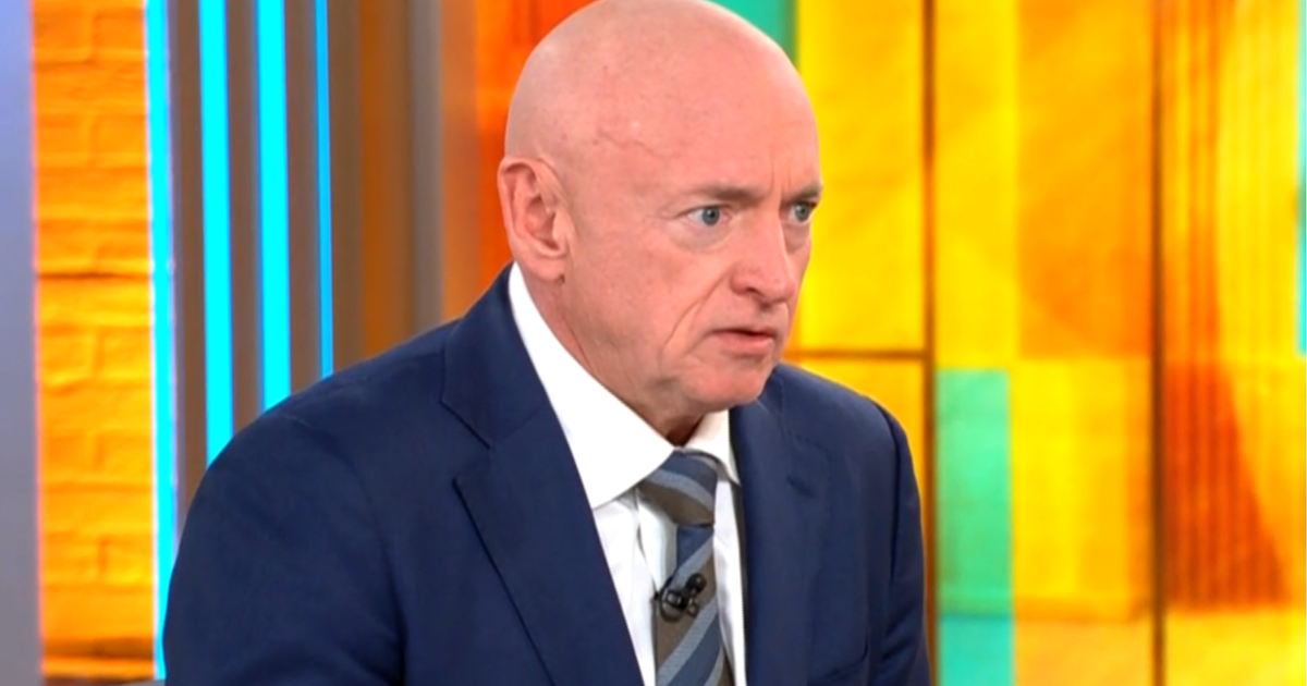 Sen. Mark Kelly says Hegseth's move to demote him "is about stifling people's speech"